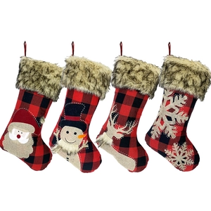 Set of 4 buffalo plaid Christmas stockings with plush fur trim and festive character patches