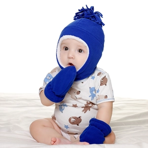 Detail of navy blue fleece hat and mittens set with soft white faux fur lining for kids