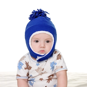 Detail of dark blue fleece baby winter hat with plush lining and velcro chin strap