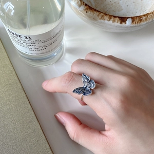 Vintage 925 sterling silver butterfly ring with blue enamel and adjustable open band
