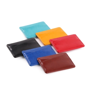 Women's slim PU leather card holder in six colors with multiple slots for bank cards