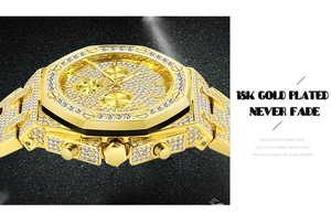 Detail of 18K gold plated watch with diamond-set octagonal bezel and sapphire glass