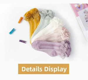 Detail of five-pair set of girls lace socks in pastel colors with mesh knit texture