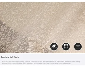 Detail of champagne soft tulle fabric featuring exquisite floral embroidery and subtle glitter