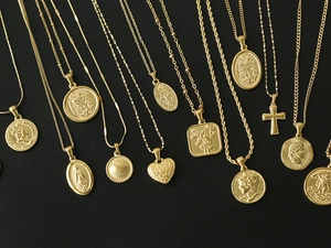 Collection of 18K gold plated titanium necklaces with coin, cross and heart pendants