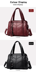 Detail of red and black quilted leather handbags with woven handles and cat charms