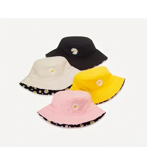 Double-sided daisy embroidered bucket hats in four colors with floral print lining