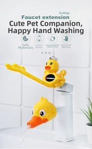 Detail view of yellow duck cartoon faucet extender with splash guard for kids washing hands