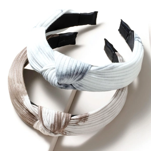 Vintage knot headband with striped tie-dye patterns in grey and brown soft fabric