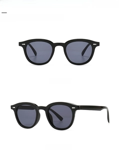 Front and side views of vintage retro narrow oval sunglasses in polished black frame