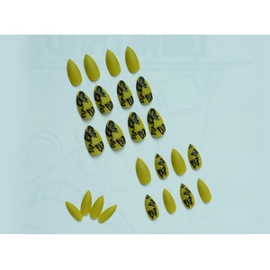 Matte mustard yellow press-on nails with elegant black butterfly patterns on white background