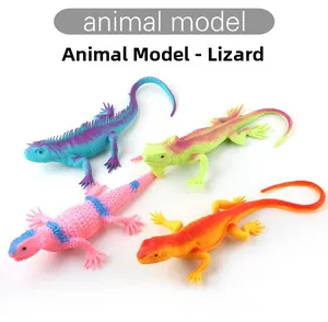 Detail of four colorful soft rubber lizard models with realistic scale textures and vibrant skins