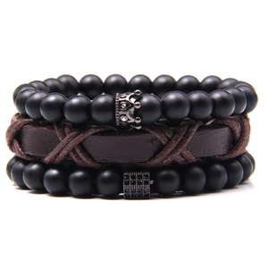 Three-piece bohemian set with natural stone beads, crown charm and brown braided leather strap