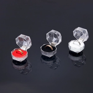 Octagon acrylic jewelry box with diamond cut design and colorful velvet inserts
