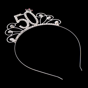 Close-up of sparkling rhinestone number 50 on a silver birthday crown headband