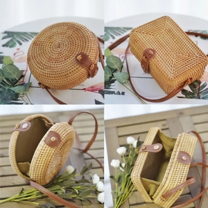 Detailed views of round and rectangular woven rattan bags with leather straps and green lining