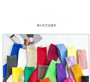 Close-up of ribbed cotton socks in various vibrant solid colors like red and blue