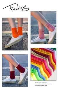 Detail of vibrant ribbed cotton crew socks in multiple colors with a soft fine texture