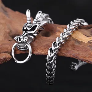 Bracelet tête de dragon pour homme en acier titane avec chaîne à structure vertébrale