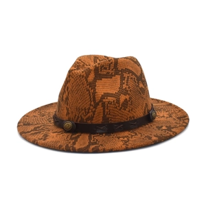 Detail of snake print wool fedora featuring leather band and vintage metal studs