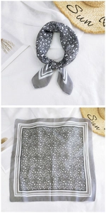 Detail of grey leopard print cotton linen square scarf showing tied and flat styles
