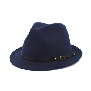 Detail of navy blue fedora hat featuring wool texture and leather belt with gold buckle