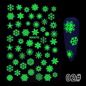 Luminous green snowflake nail stickers glowing in the dark for Halloween nail art