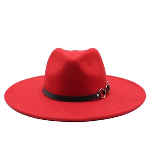 Classic red wool fedora hat with wide brim and black leather belt featuring silver rings
