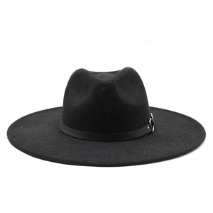 Detailed close-up of wide brim wool fedora hat featuring black leather band and silver buckle
