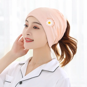 Pink cotton maternity beanie for women with embroidered daisy and Little Daisy text detail