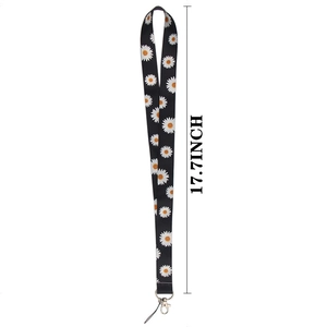 Detail view of 17.7-inch daisy pattern lanyard with metal hook and phone strap attachment
