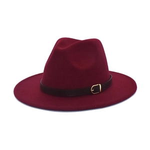 Elegant wine red wool fedora hat with black leather strap and gold buckle detail