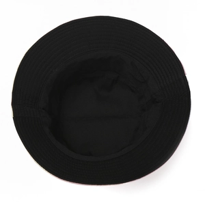 Top view detail of black canvas bucket hat interior with reinforced stitching on the brim