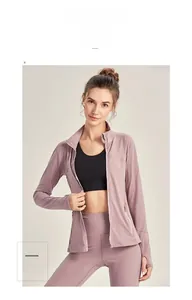 Detail view of mauve sports jacket featuring thumbhole cuffs and laser-cut ventilation holes