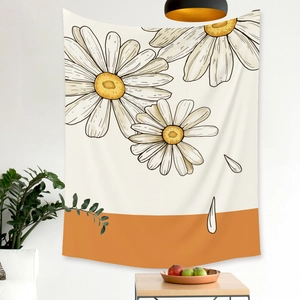 Detail of modern wall tapestry with large daisy pattern and orange color block