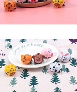 Detail showing a colorful collection of cute animal-shaped pull back toy cars for kids