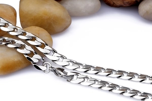 Macro shot of 7mm silver titanium steel rhombic chain with a secure lobster clasp