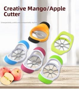 Detail view of colorful stainless steel fruit slicers on a rustic wooden table surface
