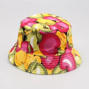 Detail of colorful apple print patterns on a canvas cotton kids bucket sun hat