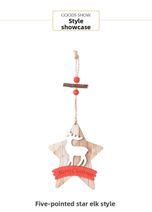 Detail view of a star-shaped wooden Christmas ornament with a white reindeer silhouette