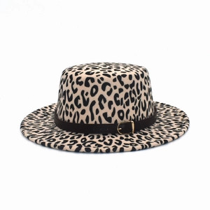 Detailed view of the leopard print wool boater hat with a brown faux leather belt strap