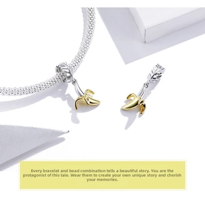 Detailed close-up of S925 silver mesh bracelet featuring playful two-tone banana charms