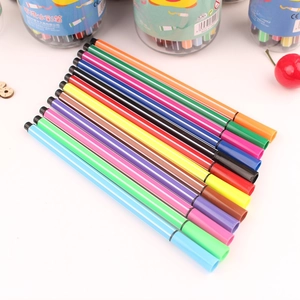 Detail view of colorful washable watercolor pens in a neat rainbow row for creative kids