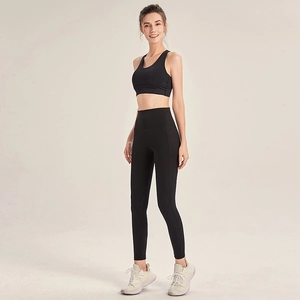 Black high-waisted yoga set featuring sports bra and slim-fit leggings for workout training