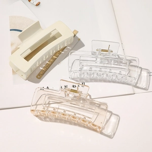 Three-piece set of 11cm matte hair clips in cream, clear, and amber with hollow rectangle design
