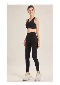 Detail of high-waist yoga pants and sports bra set with high elasticity and peach lift