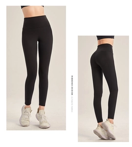 Macro detail of high-waist yoga leggings showing squat-proof fabric and butt-lift seams