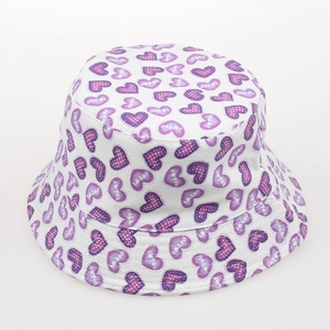 Detailed view of white canvas bucket hat featuring purple gradient heart patterns