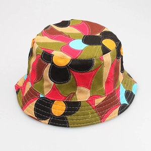 Close-up of kids bucket hat with colorful abstract patterns and white stitching details