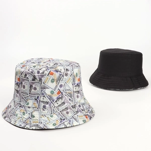 Reversible bucket hat with dollar print and solid black options for sun protection